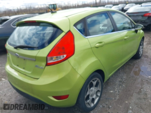 2011 Ford Fiesta SES with VIN 3FADP4FJ7BM131503, listed as a IAAI auction lot 41804351 with 233,620 mi miles. Bid and sale history available at carsss.com. Image 4.