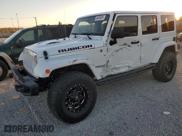 2015 Jeep Wrangler Unlimited Rubicon with VIN 1C4BJWFG5FL659017, listed as a Copart auction lot 84435034 with 69,915 mi miles and Salvage Title. Bid and sale history available at carsss.com. Image 1.