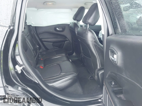 2018 Jeep Compass Altitude with VIN 3C4NJDBB6JT307069, listed as a IAAI auction lot 41351646 with 50,387 mi miles and . Bid and sale history available at carsss.com. Image 8.