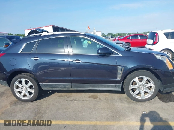 2014 Cadillac SRX Performance Collection with VIN 3GYFNCE39ES613051, listed as a IAAI auction lot 42113063 with 82,952 mi miles and . Bid and sale history available at carsss.com. Image 13.