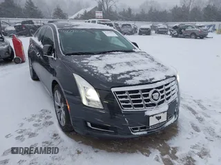 2013 Cadillac XTS with VIN 2G61N5S37D9112979, listed as a IAAI auction lot 41209826 with 83,237 mi miles. Bid and sale history available at carsss.com. Image 1.
