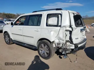 2015 Honda Pilot Touring with VIN 5FNYF3H97FB023842, listed as a IAAI auction lot 41673881 with 106,110 mi miles. Bid and sale history available at carsss.com. Image 3.