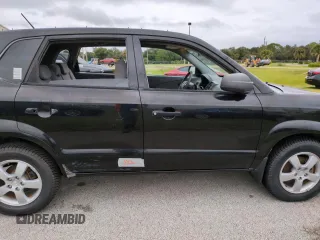 2005 Hyundai Tucson GL with VIN KM8JM12BX5U071182, listed as a Copart auction lot 74852974 with 74,235 mi miles and Salvage Title. Bid and sale history available at carsss.com. Image 13.