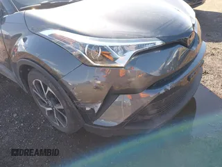 2019 Toyota C-HR XLE with VIN JTNKHMBX4K1048614, listed as a IAAI auction lot 41800696 with 78,191 mi miles. Bid and sale history available at carsss.com. Image 6.