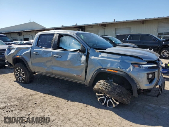 2024 GMC Canyon 4WD AT4 with VIN 1GTP6DEK8R1264699, listed as a Copart auction lot 76604464 with 2,406 mi miles and Salvage Title. Bid and sale history available at carsss.com. Image 4.