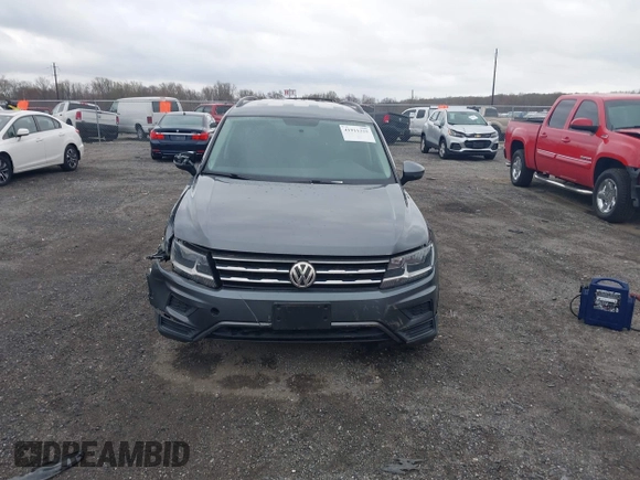 2019 Volkswagen Tiguan S with VIN 3VV0B7AX1KM046808, listed as a IAAI auction lot 41911225 with 62,972 mi miles and . Bid and sale history available at DreamBid. Image 12.
