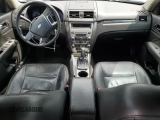 2012 Ford Fusion SEL with VIN 3FAHP0JA0CR386841, listed as a Copart auction lot 61587325 with 129,572 mi miles and Salvage title. Bid and sale history available at DreamBid. Image 8.