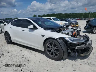 2021 Tesla Model S Long Range with VIN 5YJSA1E52MF443953, listed as a Copart auction lot 59838715 with 54,643 mi miles and Salvage title. Bid and sale history available at DreamBid. Image 4.