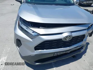 2022 Toyota RAV4 XLE z VIN 2T3W1RFV5NC213609, wystawiony jako IAAI lot #42561113 z przebiegiem 22 125 mil mil oraz . Historia ofert i sprzedaży dostępna na DreamBid. Obrazek 17.