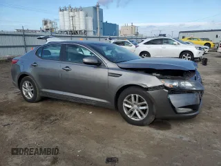 2013 Kia Optima LX z VIN 5XXGM4A70DG221110, wystawiony jako Copart lot #83440674 z przebiegiem Nie podano mil oraz Szkody całkowita. Historia ofert i sprzedaży dostępna na DreamBid. Obrazek 4.