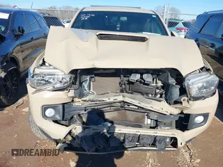 2017 Toyota Tacoma SR5 with VIN 3TMBZ5DN8HM009538, listed as a IAAI auction lot 41288551 with 84,551 mi miles and . Bid and sale history available at DreamBid. Image 12.
