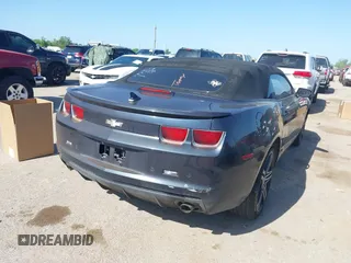 2013 Chevrolet Camaro LT z VIN 2G1FC3D33D9134173, wystawiony jako IAAI lot #41954984 z przebiegiem 157 919 mil mil oraz . Historia ofert i sprzedaży dostępna na DreamBid. Obrazek 4.