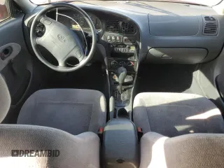 2001 Kia Sephia z VIN KNAFB121015028494, wystawiony jako Copart lot #81581404 z przebiegiem 86 655 mil mil oraz Szkody całkowita. Historia ofert i sprzedaży dostępna na DreamBid. Obrazek 8.