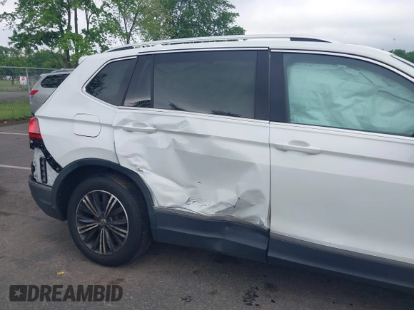 2018 Volkswagen Tiguan SEL with VIN 3VV2B7AX4JM012840, listed as a IAAI auction lot 42263511 with 105,510 mi miles and . Bid and sale history available at DreamBid. Image 6.