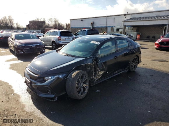 2019 Honda Civic Hatchback Sport with VIN SHHFK7G41KU222409, listed as a Copart auction lot 84746244 with 31,637 mi miles and Salvage Title. Bid and sale history available at carsss.com. Image 1.