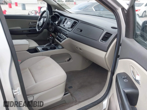 2015 Kia Sedona L with VIN KNDMA5C16F6027418, listed as a IAAI auction lot 42129259 with 78,097 mi miles. Bid and sale history available at carsss.com. Image 5.
