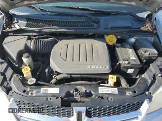2014 Dodge Grand Caravan SXT z VIN 2C4RDGCG6ER223900, wystawiony jako Copart lot #56960965 z przebiegiem 101 275 mil mil oraz Szkoda całkowita • Salvage title. Historia ofert i sprzedaży dostępna na DreamBid. Obrazek 12.