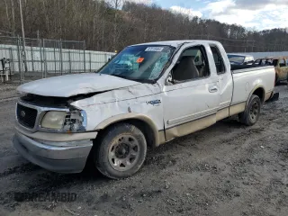 1999 Ford F-250 with VIN 1FTRX27L9XKA27324, listed as a Copart auction lot 87019484 with 152,787 mi miles and Salvage title. Bid and sale history available at DreamBid. Image 1.