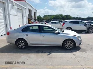 2012 Volkswagen Jetta Sedan SE w/Convenience with VIN 3VWDX7AJ1CM401939, listed as a IAAI auction lot 41941070 with 123,611 mi miles. Bid and sale history available at carsss.com. Image 13.