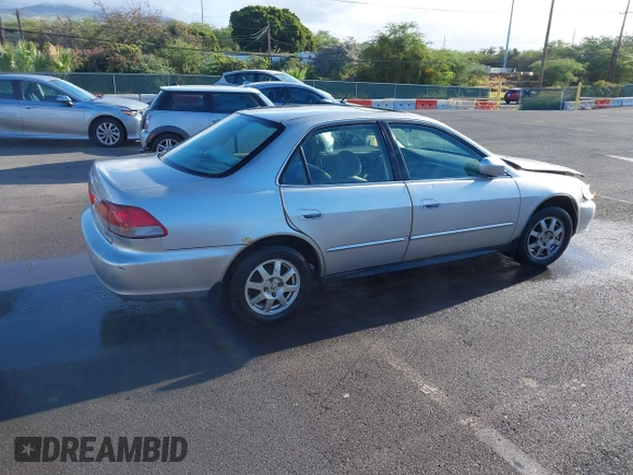 2002 Honda Accord SE with VIN 1HGCG56712A064900, listed as a IAAI auction lot 42184540 with Not provided miles and . Bid and sale history available at DreamBid. Image 4.