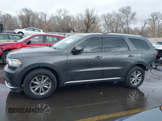 2015 Dodge Durango Limited with VIN 1C4RDJDG1FC873918, listed as a IAAI auction lot 41593090 with 137,871 mi miles and . Bid and sale history available at DreamBid. Image 15.