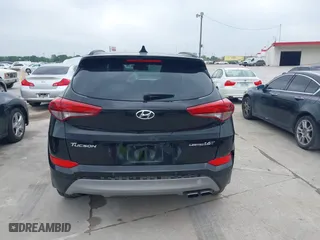 2017 Hyundai Tucson Value with VIN KM8J33A26HU362363, listed as a IAAI auction lot 41940376 with 127,986 mi miles. Bid and sale history available at carsss.com. Image 16.