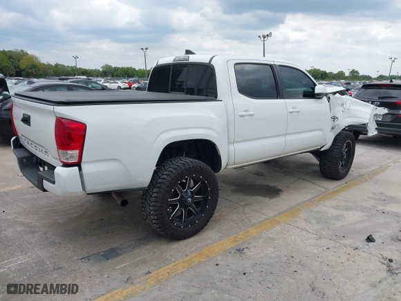 2017 Toyota Tacoma SR with VIN 5TFAX5GN7HX093195, listed as a IAAI auction lot 41860071 with 152,925 mi miles. Bid and sale history available at carsss.com. Image 4.