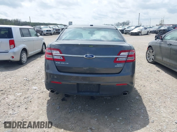 2015 Ford Taurus SEL with VIN 1FAHP2E81FG122378, listed as a IAAI auction lot 42081001 with 159,853 mi miles and . Bid and sale history available at carsss.com. Image 17.
