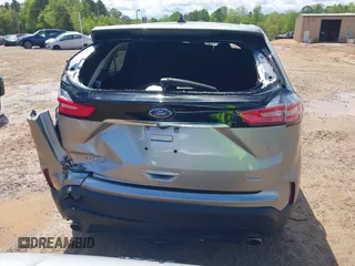 2020 Ford Edge SE z VIN 2FMPK3G90LBA58977, wystawiony jako IAAI lot #42007572 z przebiegiem 36 564 mil mil oraz . Historia ofert i sprzedaży dostępna na DreamBid. Obrazek 16.