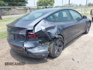 2023 Tesla Model 3 with VIN 5YJ3E1EA7PF409243, listed as a IAAI auction lot 42305360 with Not provided miles and . Bid and sale history available at DreamBid. Image 4.
