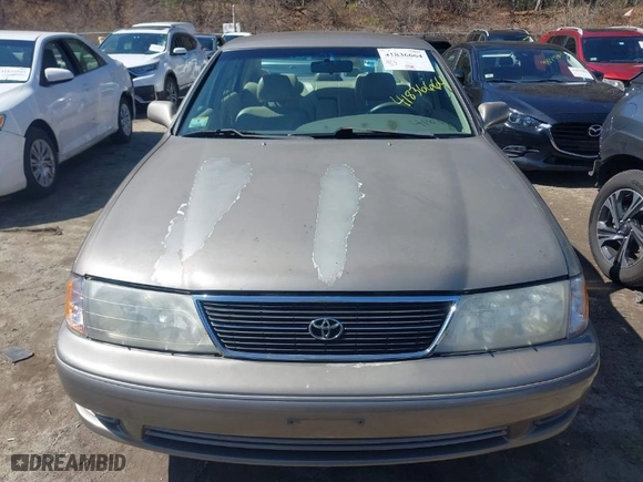 1999 Toyota Avalon XL with VIN 4T1BF18B5XU322781, listed as a IAAI auction lot 41836664 with NaN miles. Bid and sale history available at carsss.com. Image 6.