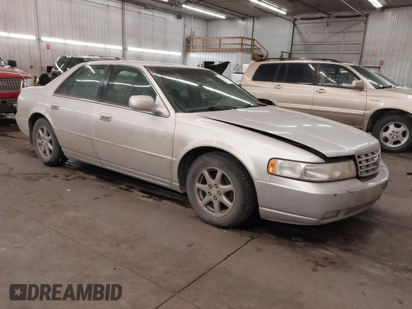 2003 Cadillac Seville Luxury SLS z VIN 1G6KS54Y93U200813, wystawiony jako IAAI lot #41544661 z przebiegiem 159 550 mil mil oraz . Historia ofert i sprzedaży dostępna na DreamBid. Obrazek 1.