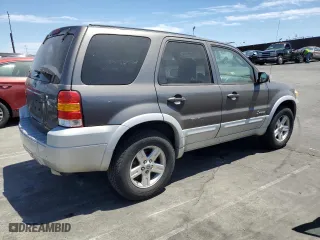 2005 Ford Escape Hybrid with VIN 1FMCU95H35KC95221, listed as a Copart auction lot 67789924 with 169,260 mi miles and Clean Title. Bid and sale history available at carsss.com. Image 3.
