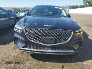 2023 Genesis GV70 2.5T с VIN KMUMADTB9PU085598, выставлен на аукционе Copart как лот 61375605 с пробегом 47 219 миль миль и Списание • Salvage title. История ставок и продаж доступна на DreamBid. Изображение 5.