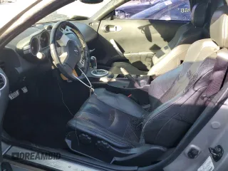 2004 Nissan 350Z Enthusiast z VIN JN1AZ36A74T015422, wystawiony jako Copart lot #77537194 z przebiegiem 147 466 mil mil oraz Nie do naprawy • Non repairable. Historia ofert i sprzedaży dostępna na DreamBid. Obrazek 7.