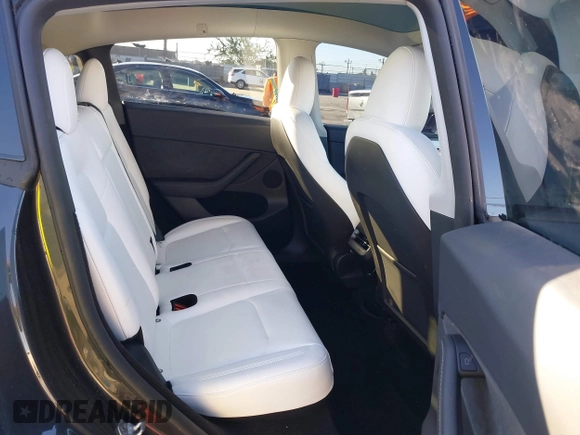 2024 Tesla Model Y с VIN 7SAYGDED7RF056018, выставлен на аукционе IAAI как лот 41322262 с пробегом 3 619 миль миль и . История ставок и продаж доступна на DreamBid. Изображение 8.