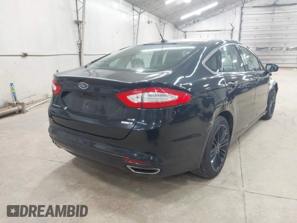 2016 Ford Fusion SE z VIN 3FA6P0T98GR111895, wystawiony jako IAAI lot #42633525 z przebiegiem 77 231 mil mil oraz . Historia ofert i sprzedaży dostępna na DreamBid. Obrazek 4.