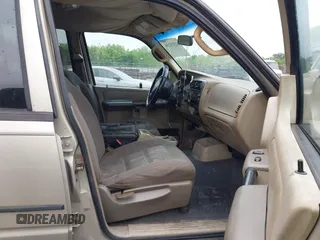2005 Ford Explorer Sport Trac XLS with VIN 1FMZU77K65UA53244, listed as a IAAI auction lot 42375234 with 240,441 mi miles and . Bid and sale history available at DreamBid. Image 5.