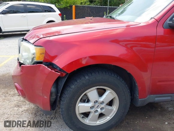 2009 Ford Escape XLS z VIN 1FMCU02799KA20370, wystawiony jako IAAI lot #42811109 z przebiegiem 195 451 mil mil oraz . Historia ofert i sprzedaży dostępna na DreamBid. Obrazek 12.