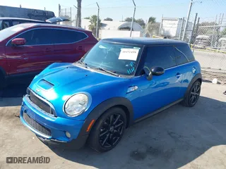 2010 MINI Cooper Hardtop S with VIN WMWMF7C51ATZ71215, listed as a IAAI auction lot 40451459 with 104,402 mi miles. Bid and sale history available at carsss.com. Image 16.