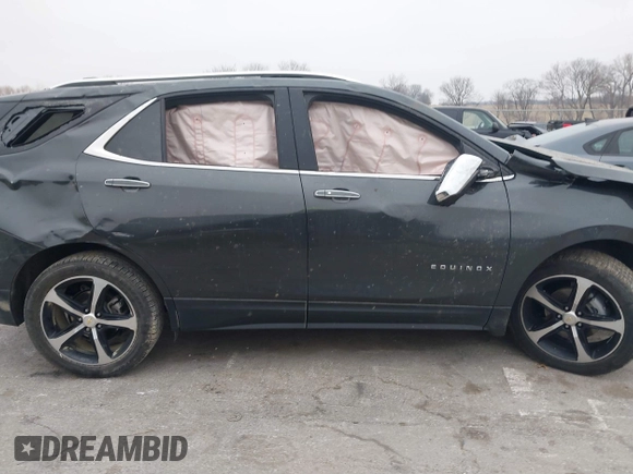 2021 Chevrolet Equinox Premier z VIN 2GNAXXEV2M6118116, wystawiony jako IAAI lot #41185151 z przebiegiem 91 837 mil mil oraz . Historia ofert i sprzedaży dostępna na DreamBid. Obrazek 13.
