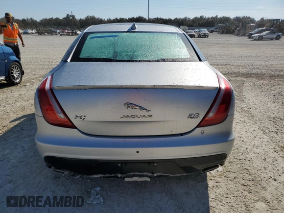 2016 Jaguar XJ R-Sport with VIN SAJWJ1CD3G8V99940, listed as a Copart auction lot 76345234 with Not provided miles and Salvage title. Bid and sale history available at DreamBid. Image 6.