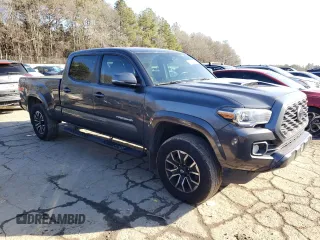 2021 Toyota Tacoma SR5 with VIN 3TMBZ5DN8MM031159, listed as a Copart auction lot 42495505 with 137,072 mi miles and Salvage title. Bid and sale history available at DreamBid. Image 4.