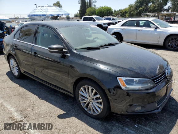 2014 Volkswagen Jetta TDI w/Premium with VIN 3VWLL7AJ8EM367587, listed as a Copart auction lot 63670815 with 129,289 mi miles and Clean title. Bid and sale history available at DreamBid. Image 4.