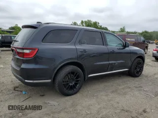 2015 Dodge Durango SXT with VIN 1C4RDJAG7FC908322, listed as a Copart auction lot 61569725 with 147,954 mi miles and Clean title. Bid and sale history available at DreamBid. Image 3.