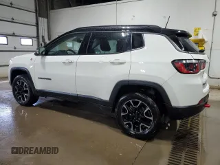 2019 Jeep Compass Trailhawk with VIN 3C4NJDDB5KT703542, listed as a Copart auction lot 54506705 with 86,178 mi miles and Salvage Title. Bid and sale history available at DreamBid. Image 2.
