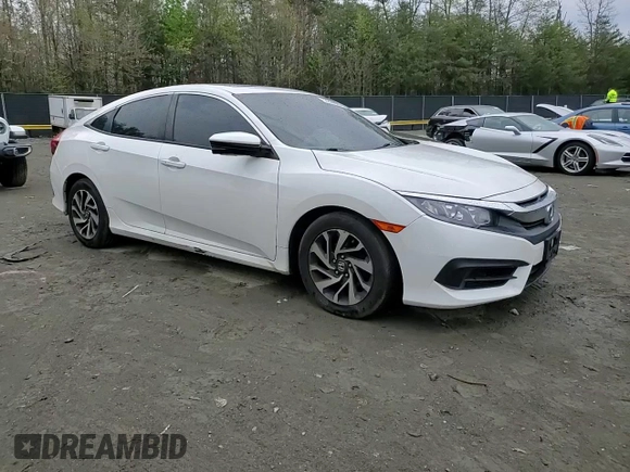 2018 Honda Civic EX с VIN 2HGFC2F72JH501729, выставлен на аукционе Copart как лот 53244695 с пробегом 123 059 миль миль и Списание • Salvage title. История ставок и продаж доступна на DreamBid. Изображение 11.