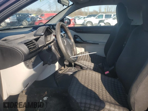2012 Scion iQ z VIN JTNJJXB00CJ014966, wystawiony jako Copart lot #83100954 z przebiegiem 100 775 mil mil oraz Szkoda całkowita • Salvage title. Historia ofert i sprzedaży dostępna na DreamBid. Obrazek 7.