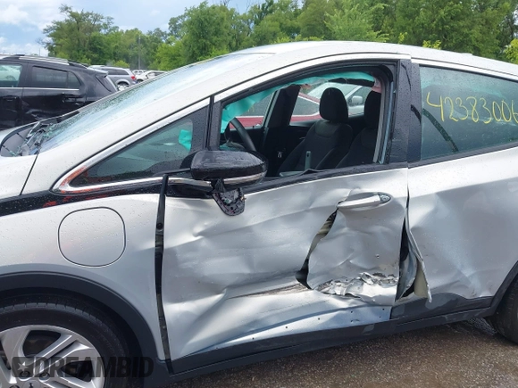 2023 Chevrolet Bolt EV 1LT with VIN 1G1FW6S03P4140824, listed as a IAAI auction lot 42383006 with 23,942 mi miles and . Bid and sale history available at DreamBid. Image 6.