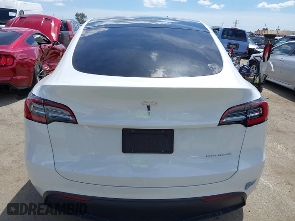 2020 Tesla Model Y Long Range with VIN 5YJYGDEE2LF058515, listed as a IAAI auction lot 41932748 with 62,885 mi miles and . Bid and sale history available at DreamBid. Image 16.
